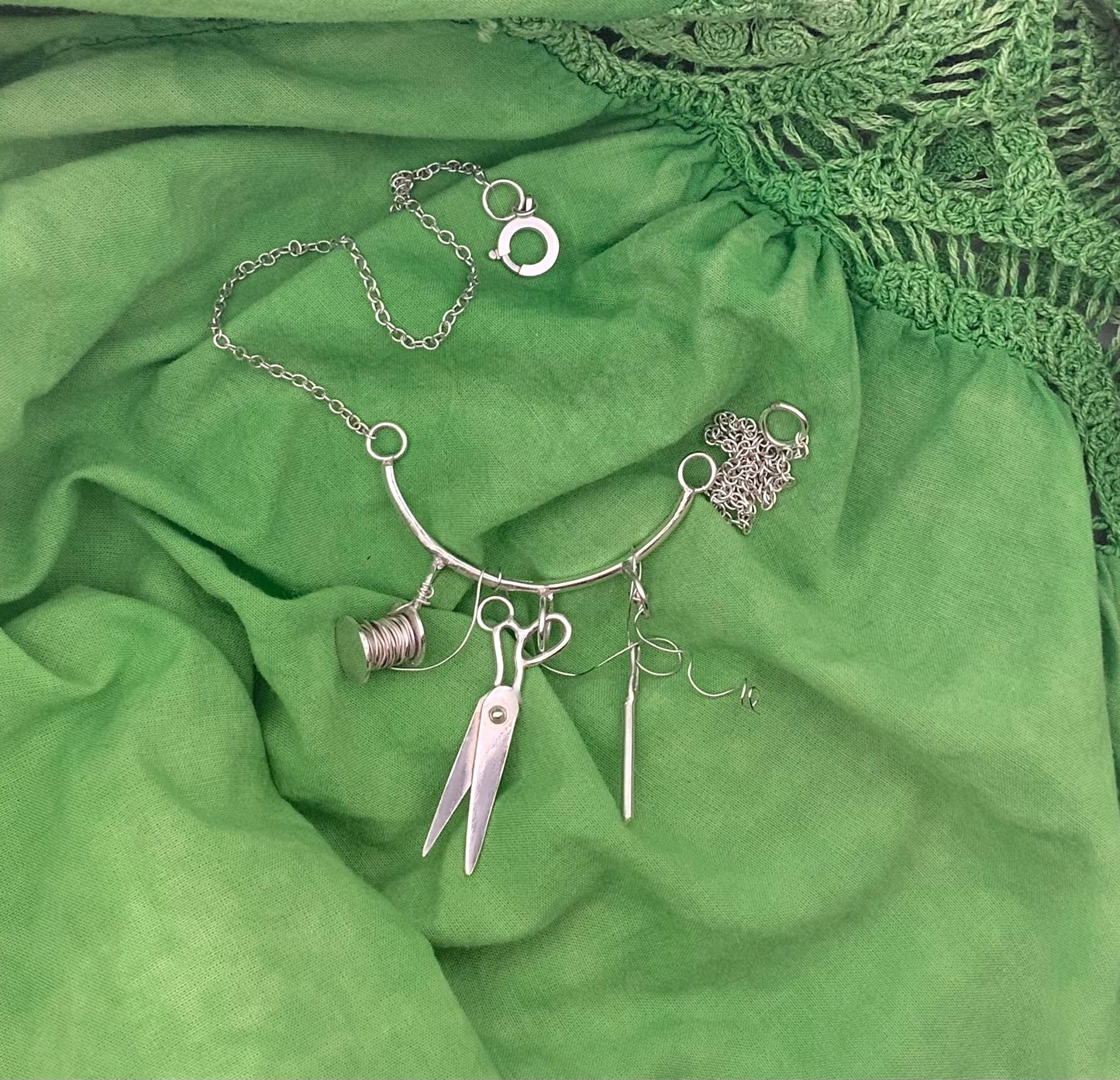 Sterling silver sewing necklace with scissors, needle and thread