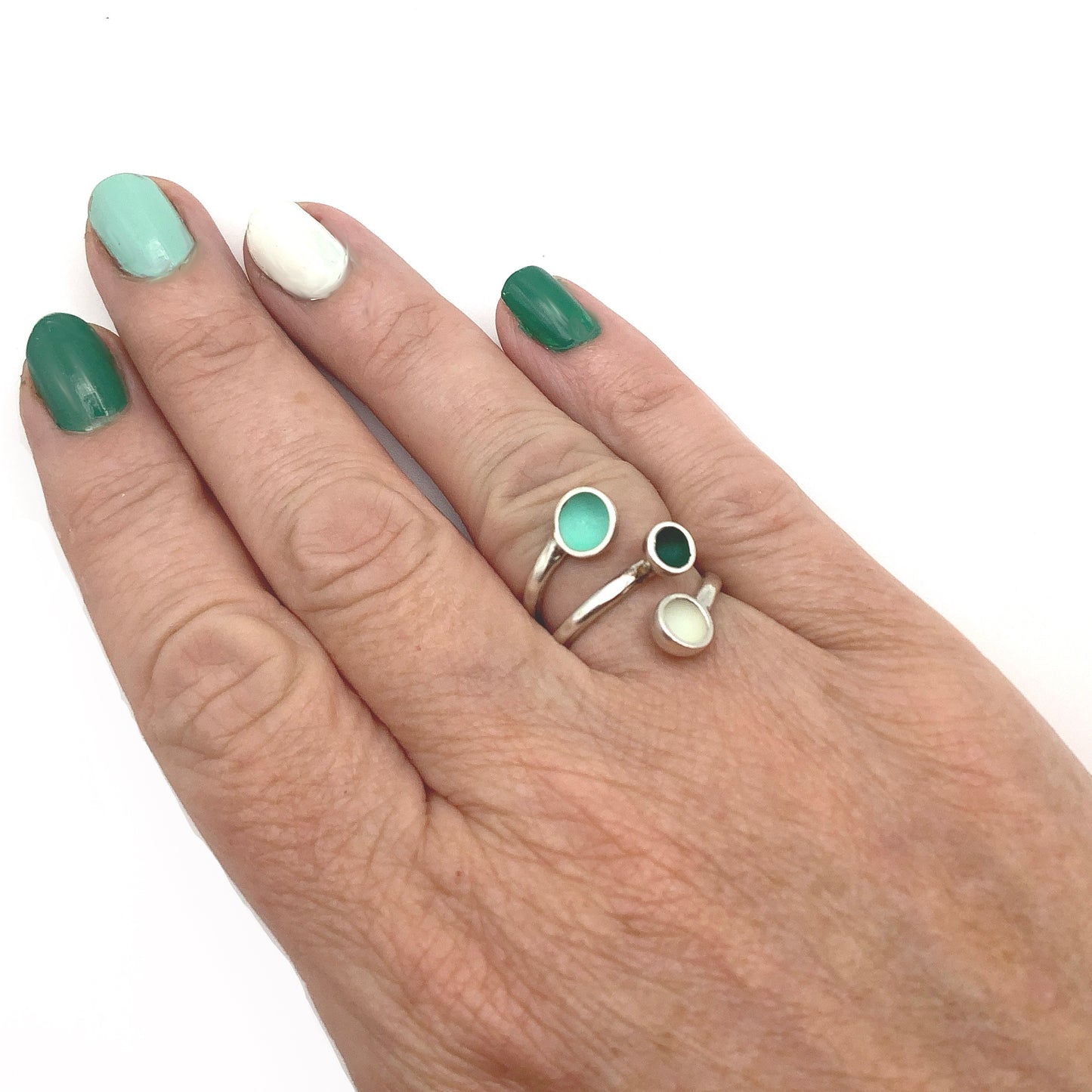 Sterling silver ring with minty green, dark emerald green and white enamel