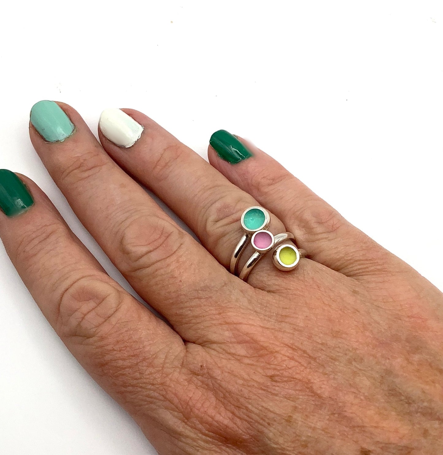 Sterling silver adjustable ring with minty green, candy pink and lemon yellow enamel