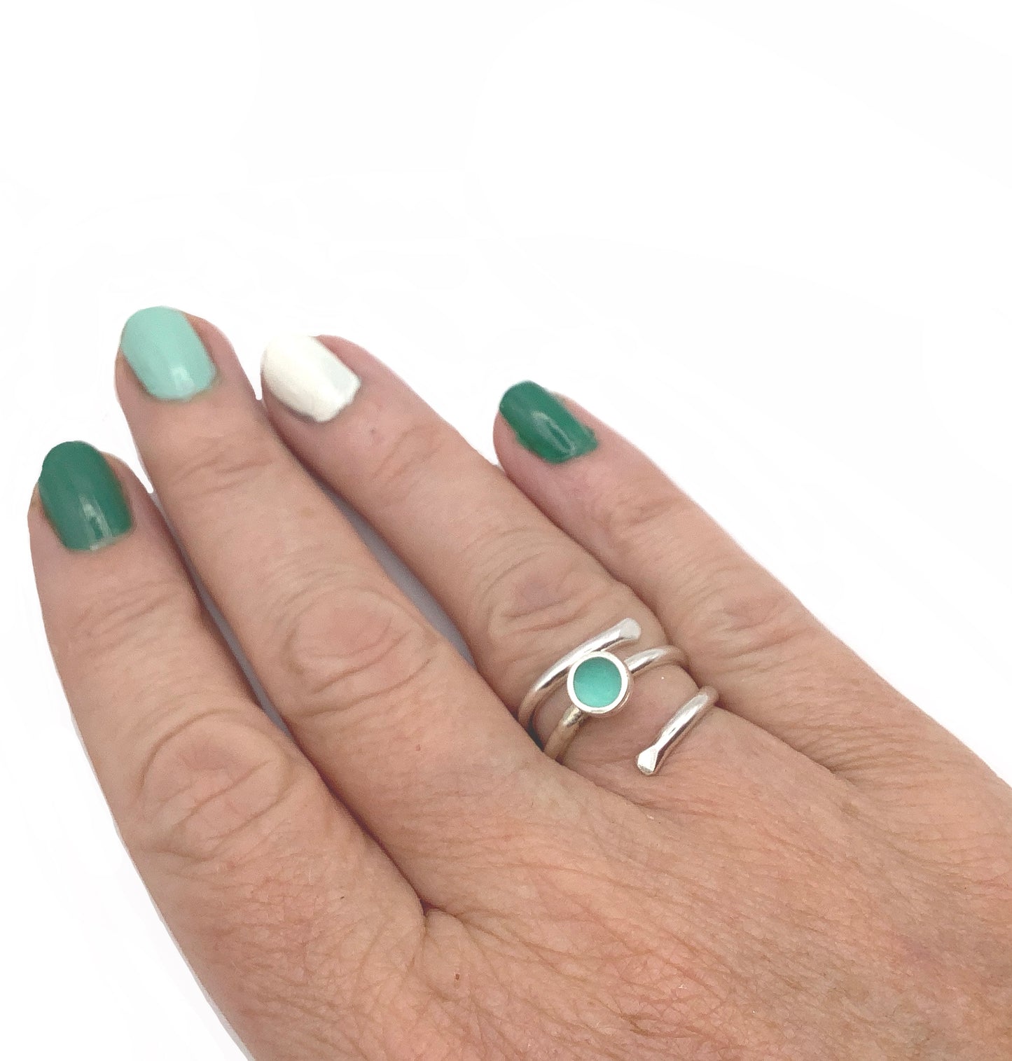 Sterling silver adjustable ring with minty green enamel
