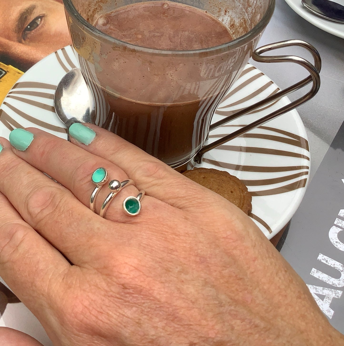Sterling silver ring with minty green and dark emerald green enamel